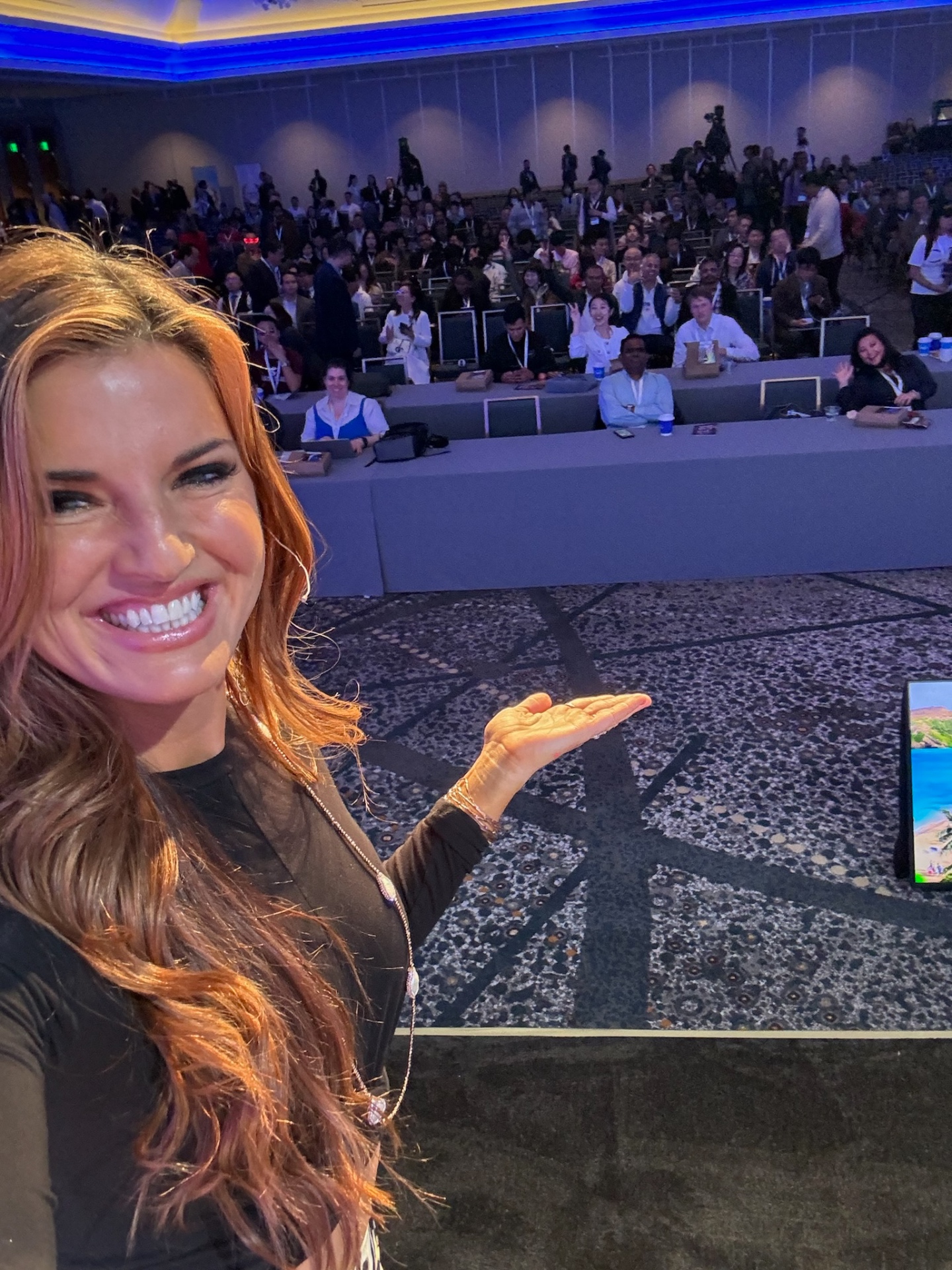 Rachele Brooke Smith smiling with the audience after a keynote